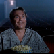 Sam Neill watches his own movie in John Carpenter’s In the Mouth of Madness.